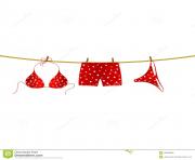 with white dots and boxer shorts with white hearts hanging on rope Wnxlox clipart